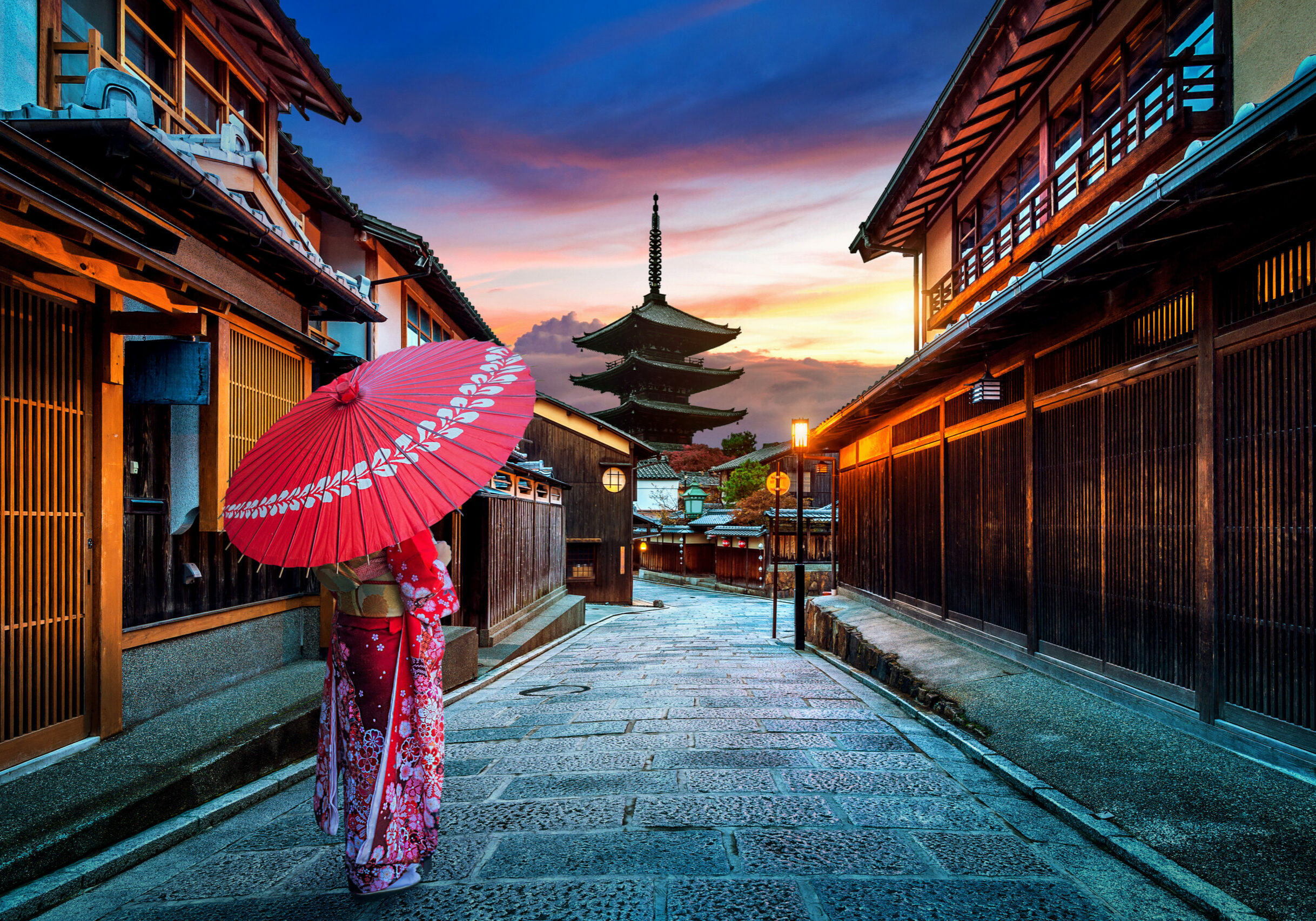 Asian woman wearing japanese traditional kimono at Yasaka Pagoda and Sannen Zaka Street in Kyoto, Japan.